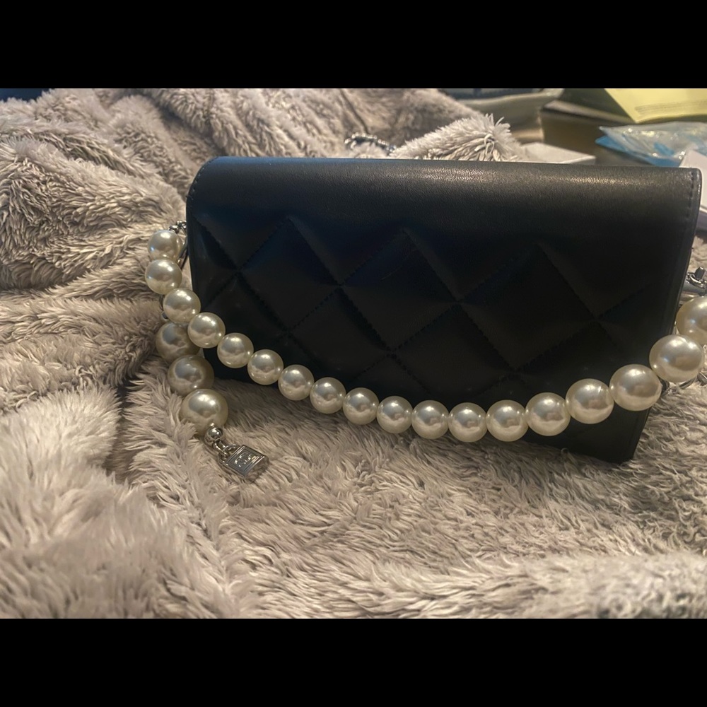 Authentic Chanel quilted leather sunglass case converted into a crossbody